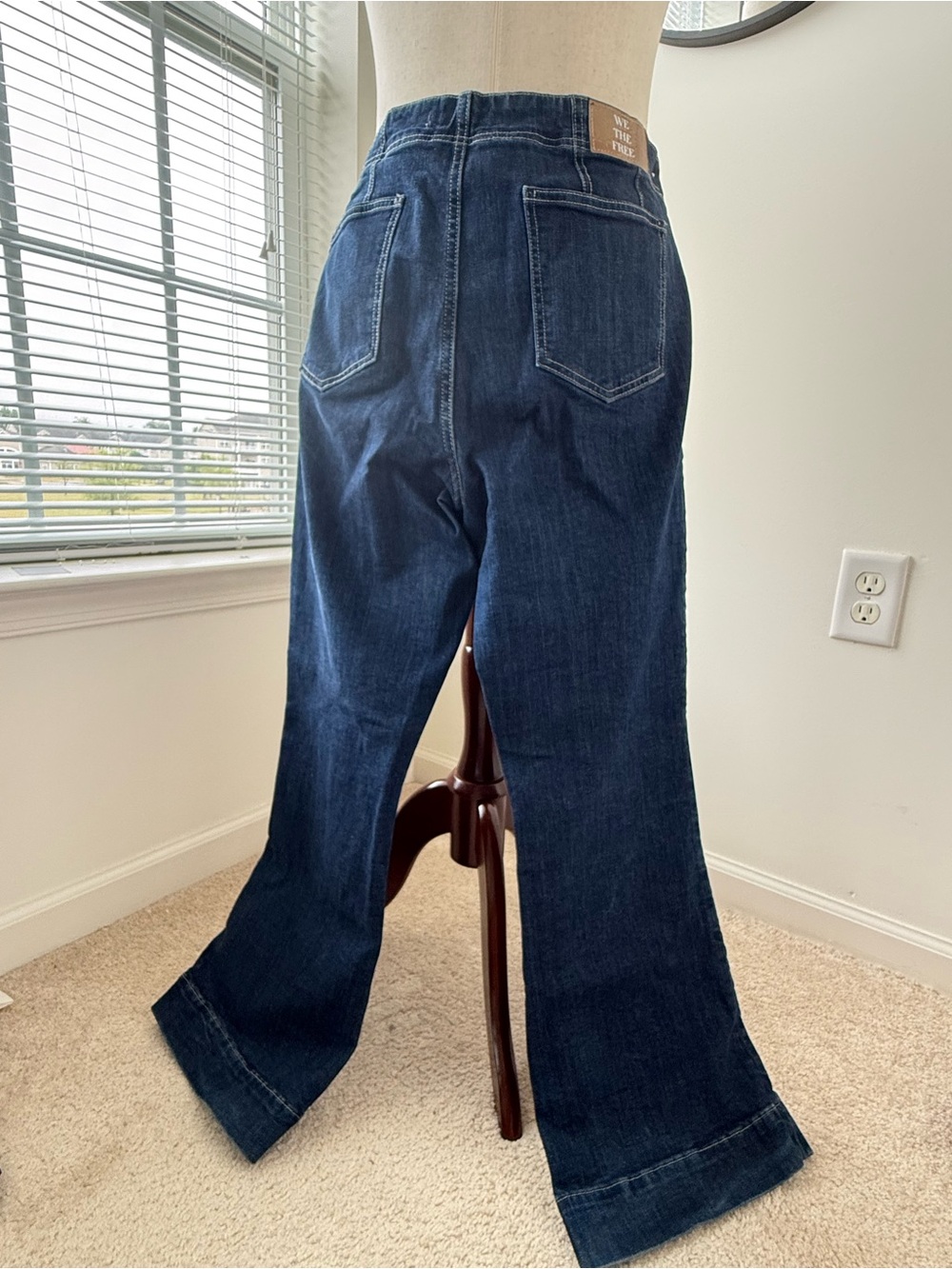 Free People Dark Indigo Flared Leg Jeans with Front Patch Pockets - Picture 2 of 12
